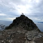 Lofoten: Barbara on the summit of the Festvågtinden