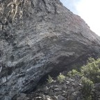 Famous Hanshelleren cave of Flatanger (really big; climbers in the left corner)