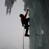 Sigi enjoys climbing the ice pillar (Photo: Richard)