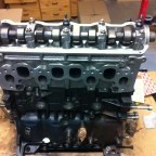 Engine reconditioning: mounted cylinder head